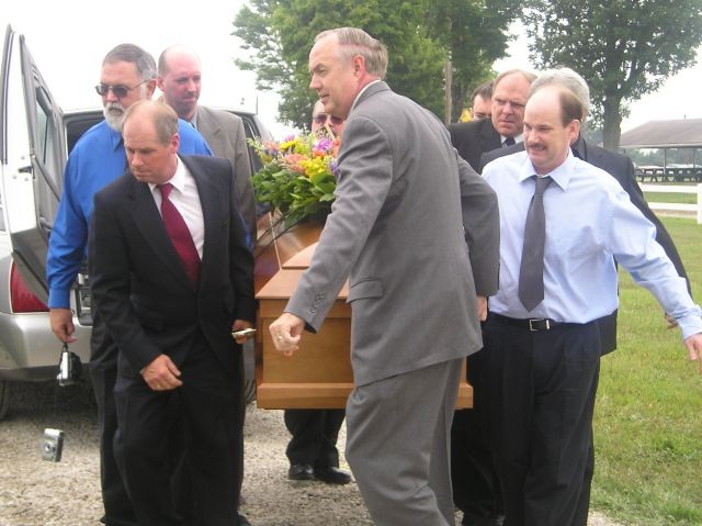 Left Side: Lloyd Solon, Paul Selegean, Travis Brown; Right Side: Ned Solon, David Garrett, Rob Garrett, Steven Brown; Middle: Roger Bartley (Funeral Director), Keith Awalt (Funeral Director)