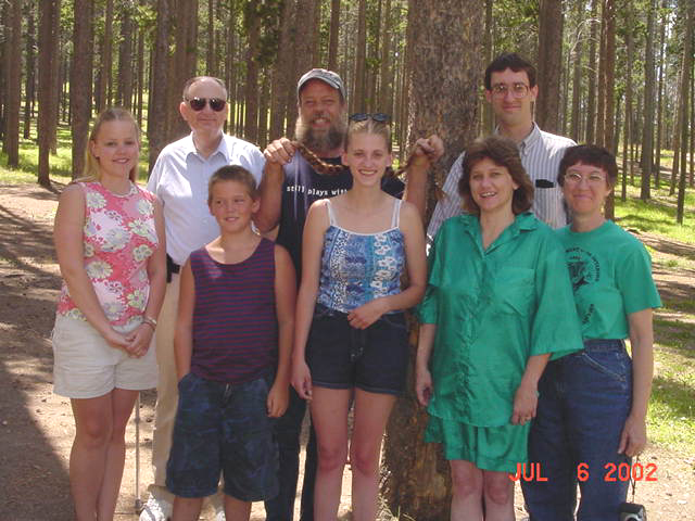 The Browns and Hansens on Casper Mountain - Front Row: Terra, TJ, Natasha and Natalie Hansen and Faye Brown; Back Row: Uncle Ben, Doug Hansen and Steven Brown (July 6, 2002)