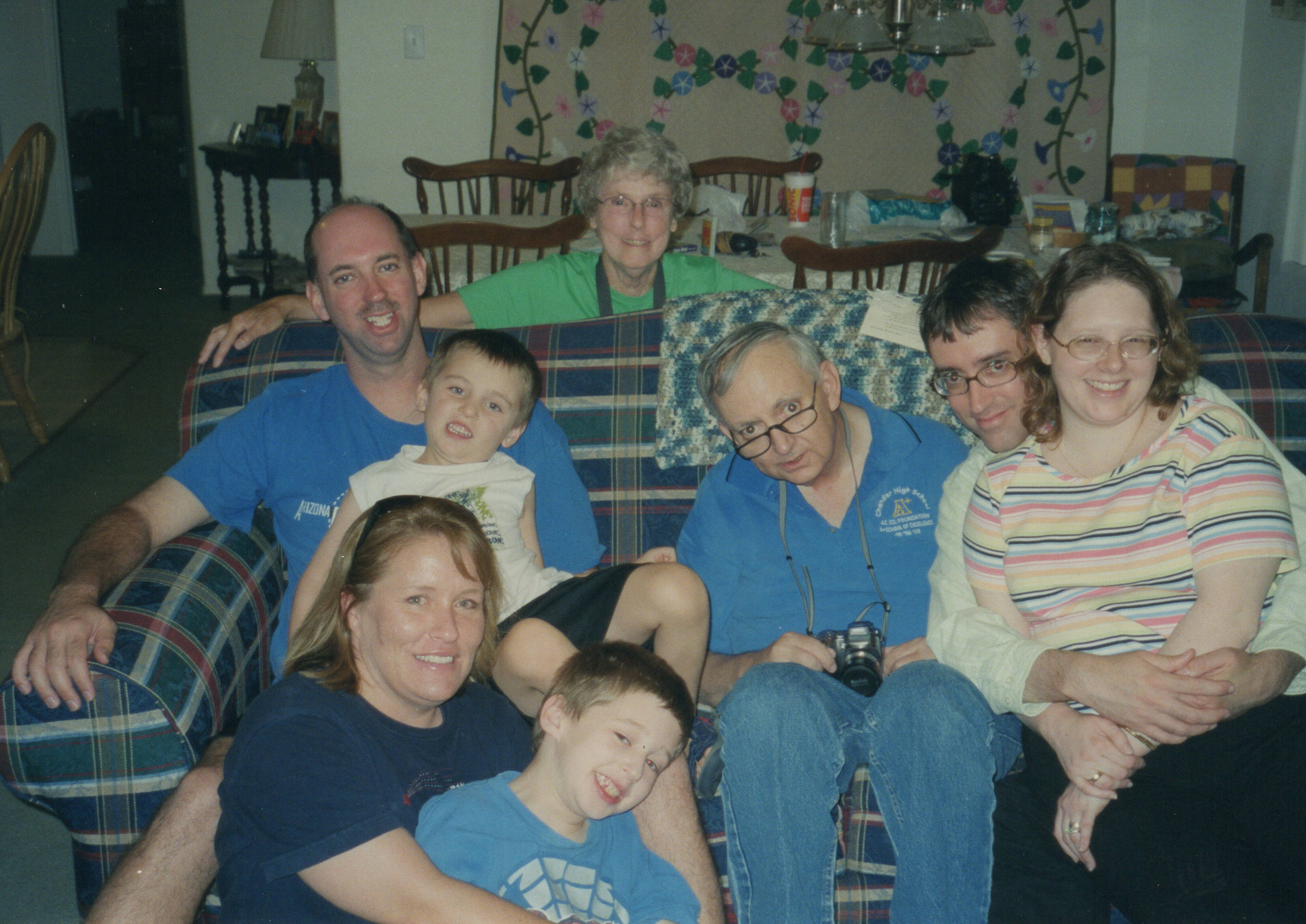 The Brown Family - Front: Kim and PIB (Paul Isaiah); Sitting: Travis, Austin, Ben, Steven and Kelly; Bette Brown behind couch (circa 2005)