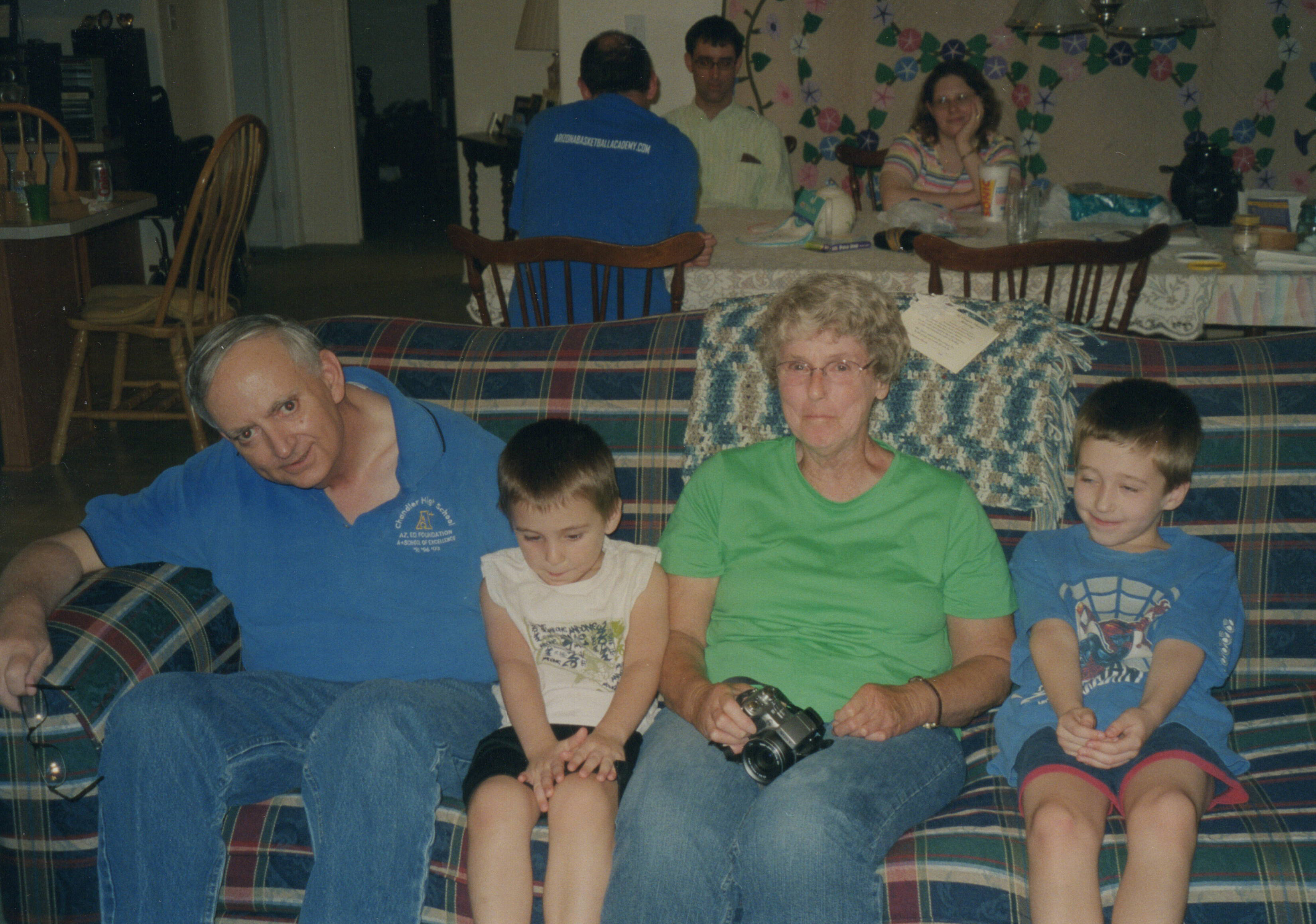Ben, Austin, Bette and Isaiah Brown; Background: Travis, Steven and Kelly Brown (circa 2005)
